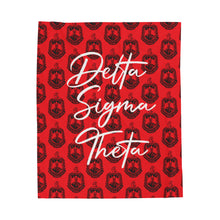 Load image into Gallery viewer, Red Velveteen Plush Blanket with Black DST Crest and White Delta Sigma Theta Theme