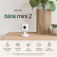 Load image into Gallery viewer, Blink Mini 2 (Newest Model) — Home Security & Pet Camera(s) with HD video, color night view, motion detection, two-way audio, and built-in spotlight — 1 camera (White)