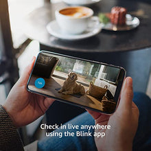 Load image into Gallery viewer, Blink Mini – Compact indoor plug-in smart security camera, 1080p HD video, night vision, motion detection, two-way audio, easy set up, Works with Alexa – 1 camera (Black)