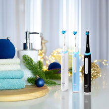 Load image into Gallery viewer, Oral-B iO Deep Clean Rechargeable Electric Powered Toothbrush, Black with iO Series 3 Limited, 2 Brush Heads and Travel Case - Pressure Sensor to Protect Gums - 3 Cleaning Settings - 2 Minute Timer