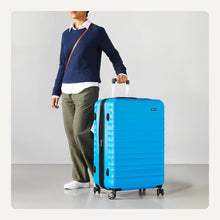 Load image into Gallery viewer, Amazon Basics 30" Hardside Large Checked Luggage, Hardshell Suitcase With Wheels, Expandable For Up to 15% More Space, With Scratch-Resistant Surface, Four Multi-directional Wheels, Light Blue