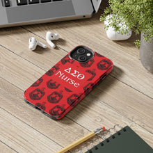 Load image into Gallery viewer, Phone Case in Red with DST Crest in Black with DST Nurse Theme
