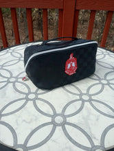 Load image into Gallery viewer, Large Capacity Black Makeup Bag with DST Crest and Charm

